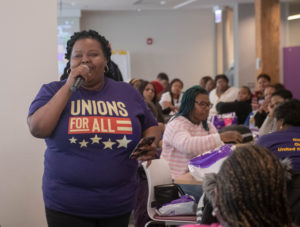 (Lakesia Collins speaks to fellow nursing home workers about why she is running for State Rep in Chicago to end poverty wages and demand for more investment in West Side). 