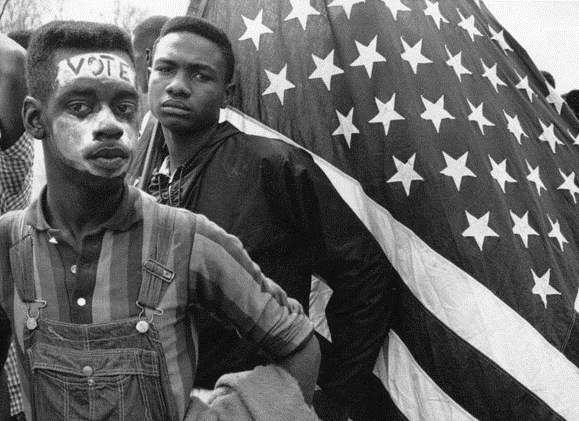 Young people demonstrating in favor of the Voting Rights Act of 1965.