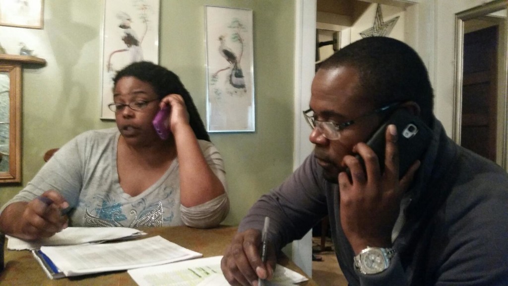 Phone-banking fellow members about the budget crisis.