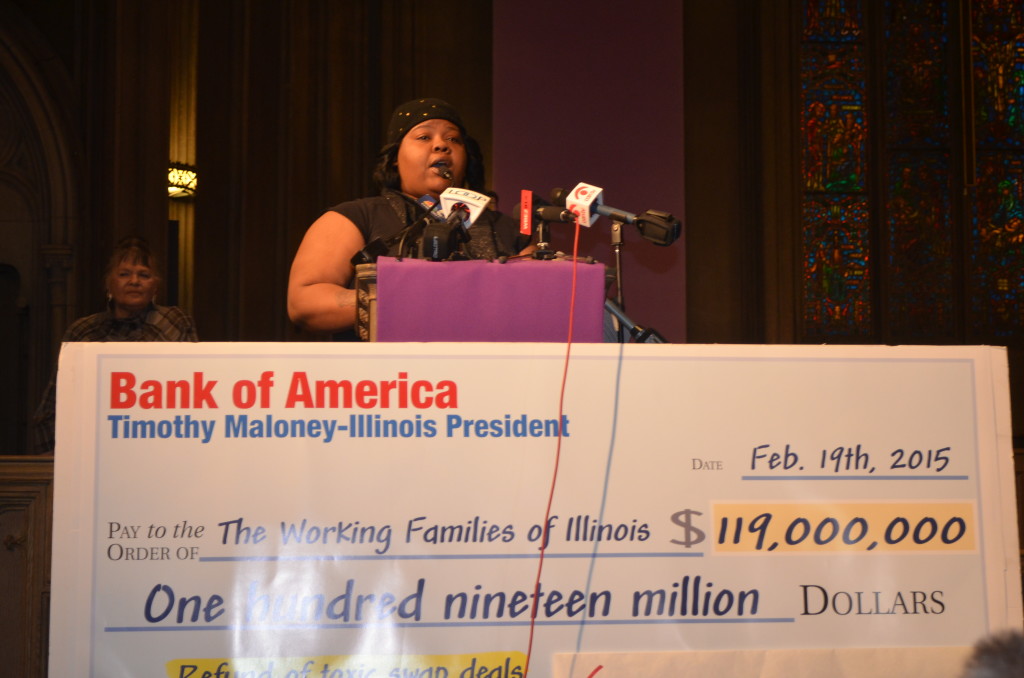 Lakeisha Collins, a nursing home worker and SEIU HCII millienal who also uses child care assistance in order to work, emceed Grassroots Illinois Action's rally at the Chicago Temple; 02/19/15.