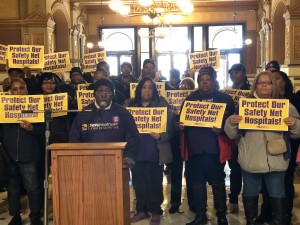 Joan Rodriguez, a housekeeper at Mt. Sinai Hospital, speaks at a press conference in the State Capitol about protecting safety net hospitals; Nov. 13th, 2018