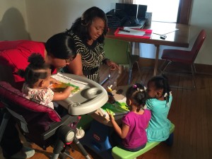 State Rep. Litesa Wallace from Rockford spends time with child care provider and young children. Rep. Wallace is an outspoken opponent of Gov. Rauner's rule changes to deny parents access to affordable child care. 