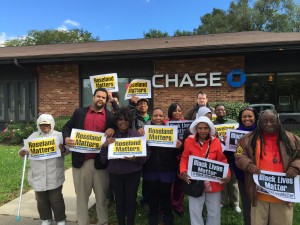 Members of the Roseland community protest Chase Bank on Thurs, Oct. 1st, 2015; to demand that the rich and large corporations pay their fair share in taxes to protect vital services and to invest in low-income neighborhoods. 