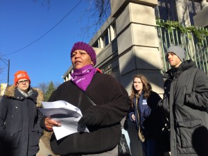 December 6th, 2017: Kim Smith, a Patient Care Tech at Northwestern Memorial Hospital and member of HCII's executive board, speaks outside of Loyola University in Chicago about the Republican "tax scam" and calls out Gov. Bruce Rauner to oppose the bill. 