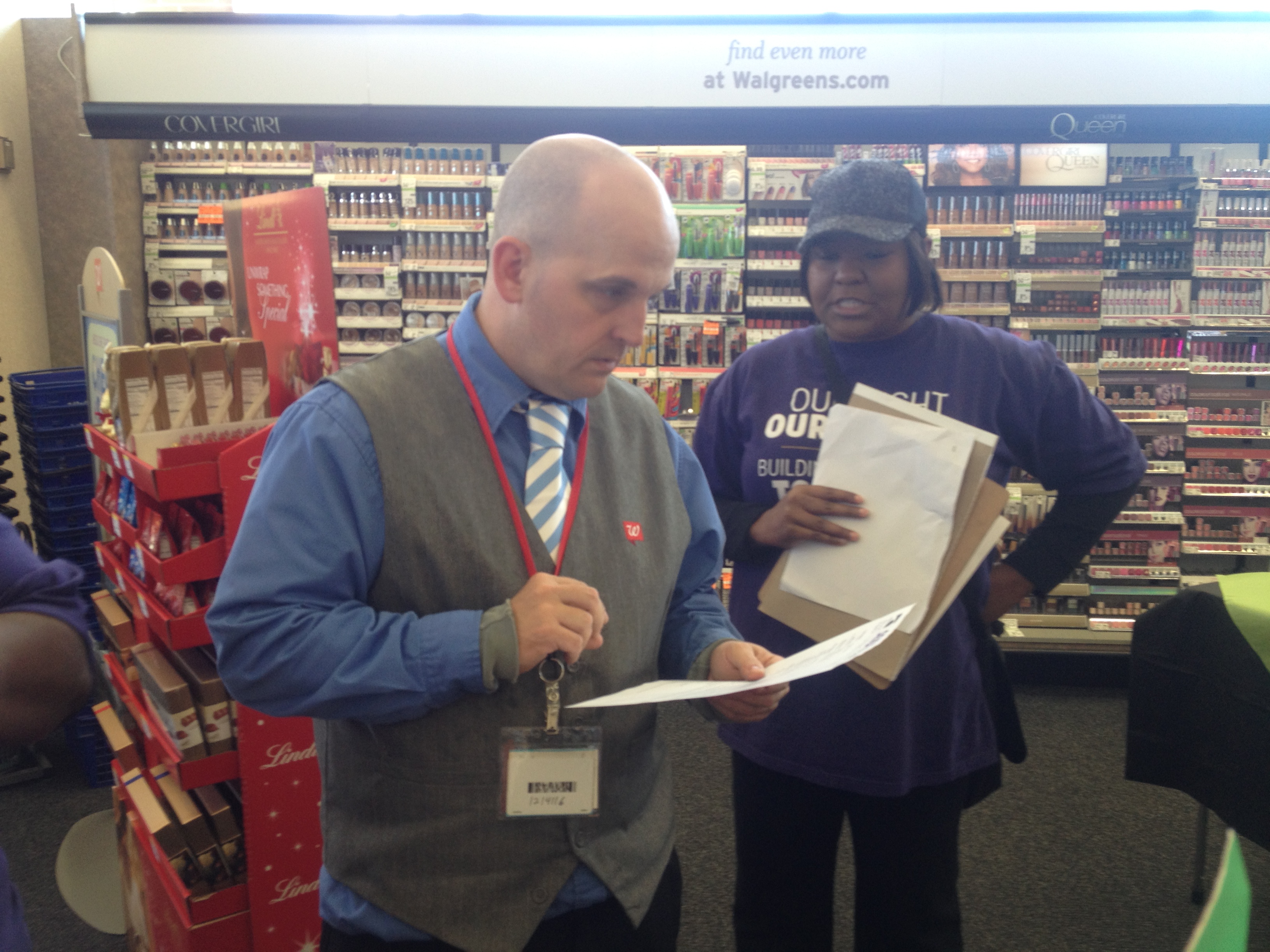 Walgreens_Manager_w_letter_fair_tax_boom_camp_11_01_13