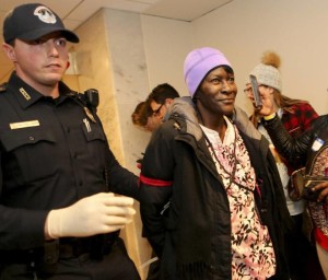 Alice Allen of Missouri, 67, who is semi-retired, is arrested in the Hart Senate Building during a protest against the repeal of the Affordable Care Act in Washington, D.C., on Tuesday, Jan. 31, 2017. A group made up of health care workers, people with pre-existing conditions and faith leaders let themselves be arrested on Capitol Hill to register dissent to Republicans' plans to repeal the Affordable Care Act, also known as Obamacare. About 50 people from 20 states were arrested for breaking the law against protesting in a Senate office building. Aude Guerrucci McClatchy