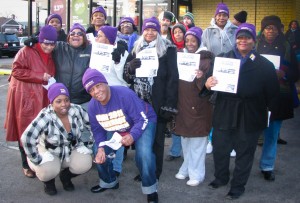 Members of SEIU and the Chatham community displayed flyers about the connections between gun violence and a lack of economic opportunity in the community.