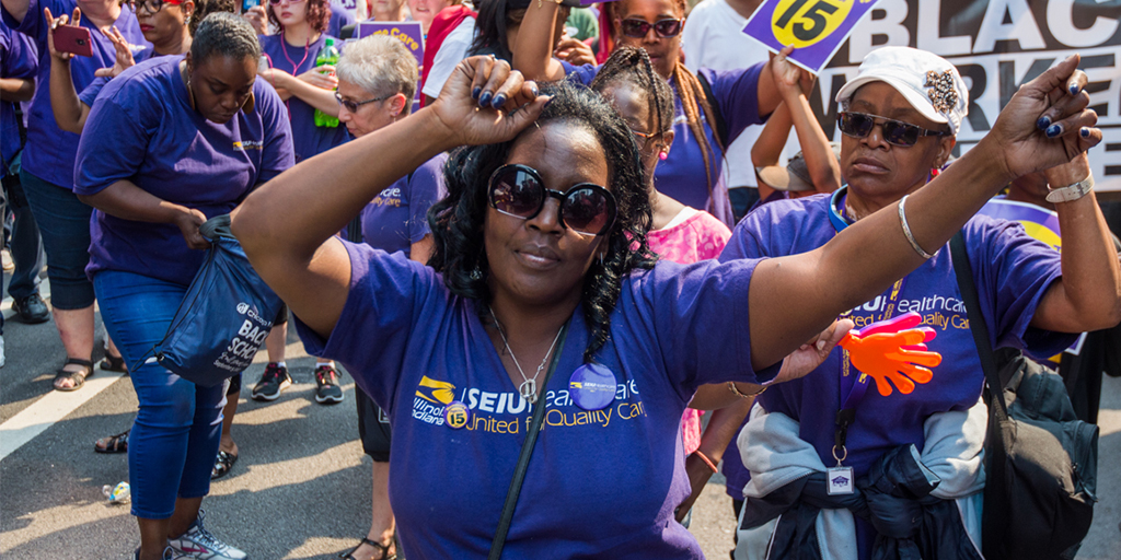 HCII member dancing at 2017 Labor Day event